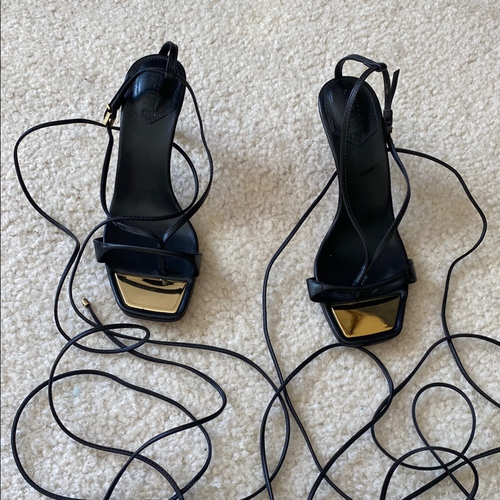 SCHUTZ Black and Gold Strappy Heels